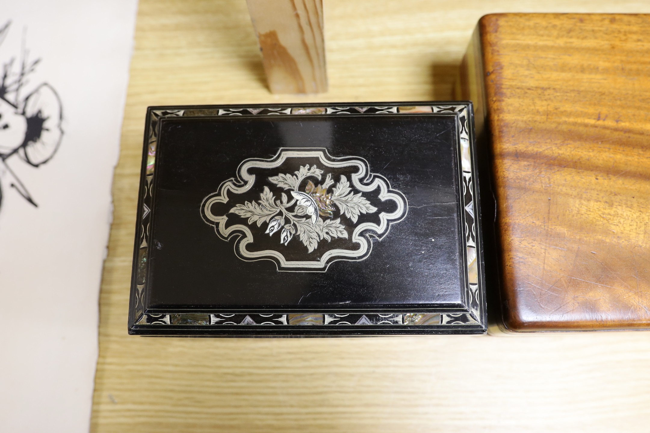 A Victorian mahogany brass bound sewing box, a mother of pearl and silver metal inlaid ebony tea caddy and another caddy, Ebony caddy 19 cms wide x 9 cms high